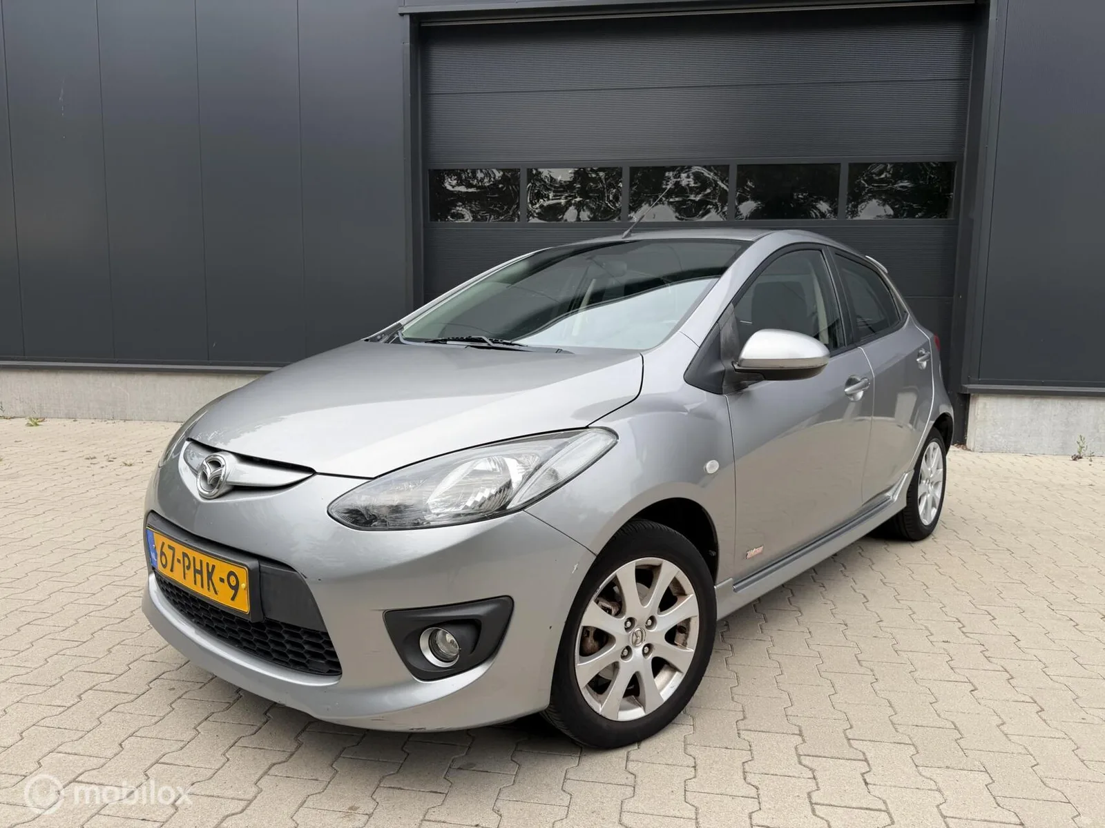 Mazda 2 (2011) — foto 1