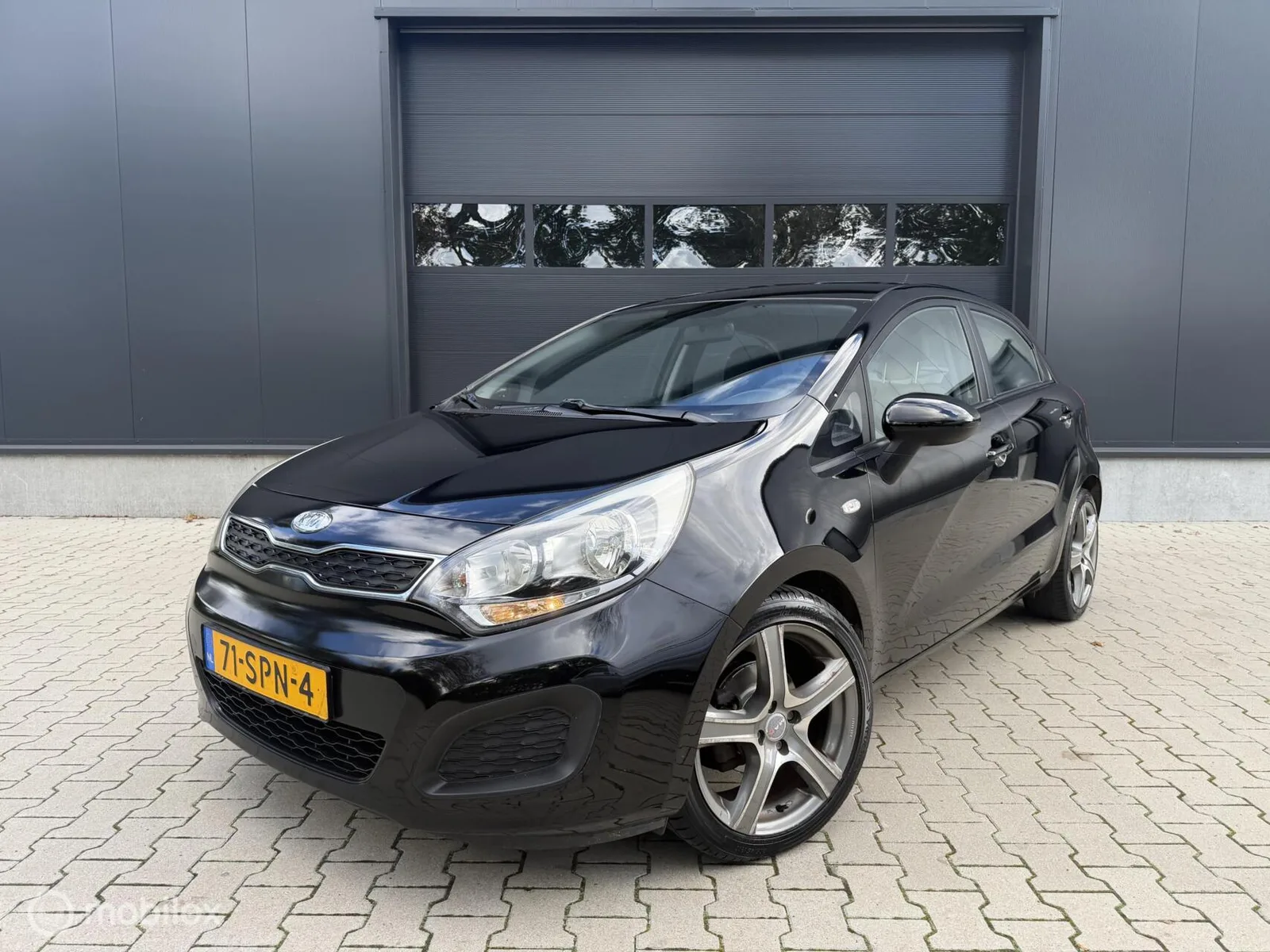 Kia Rio (2012) — foto 1