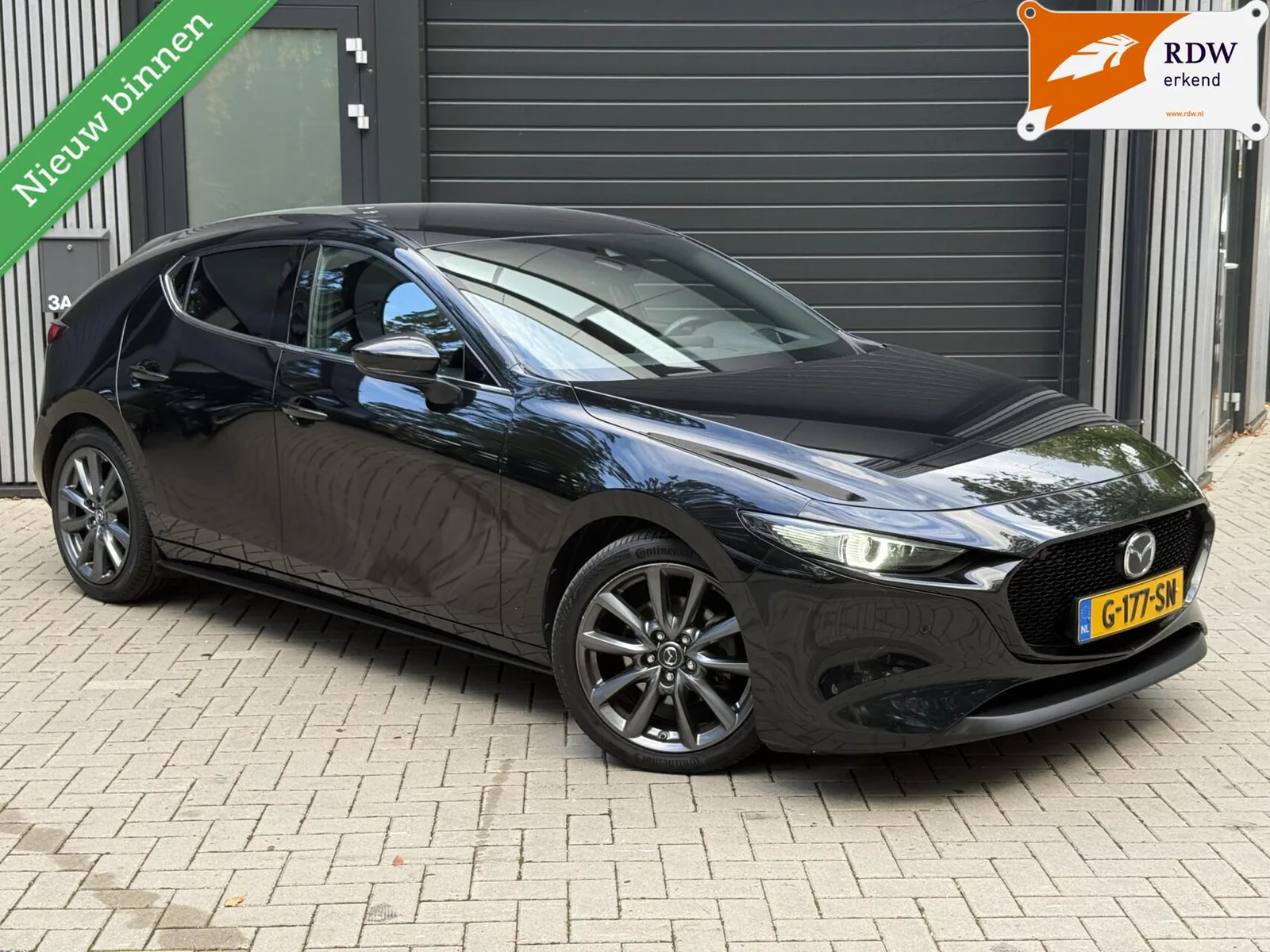 Mazda 3 (2019) — foto 1