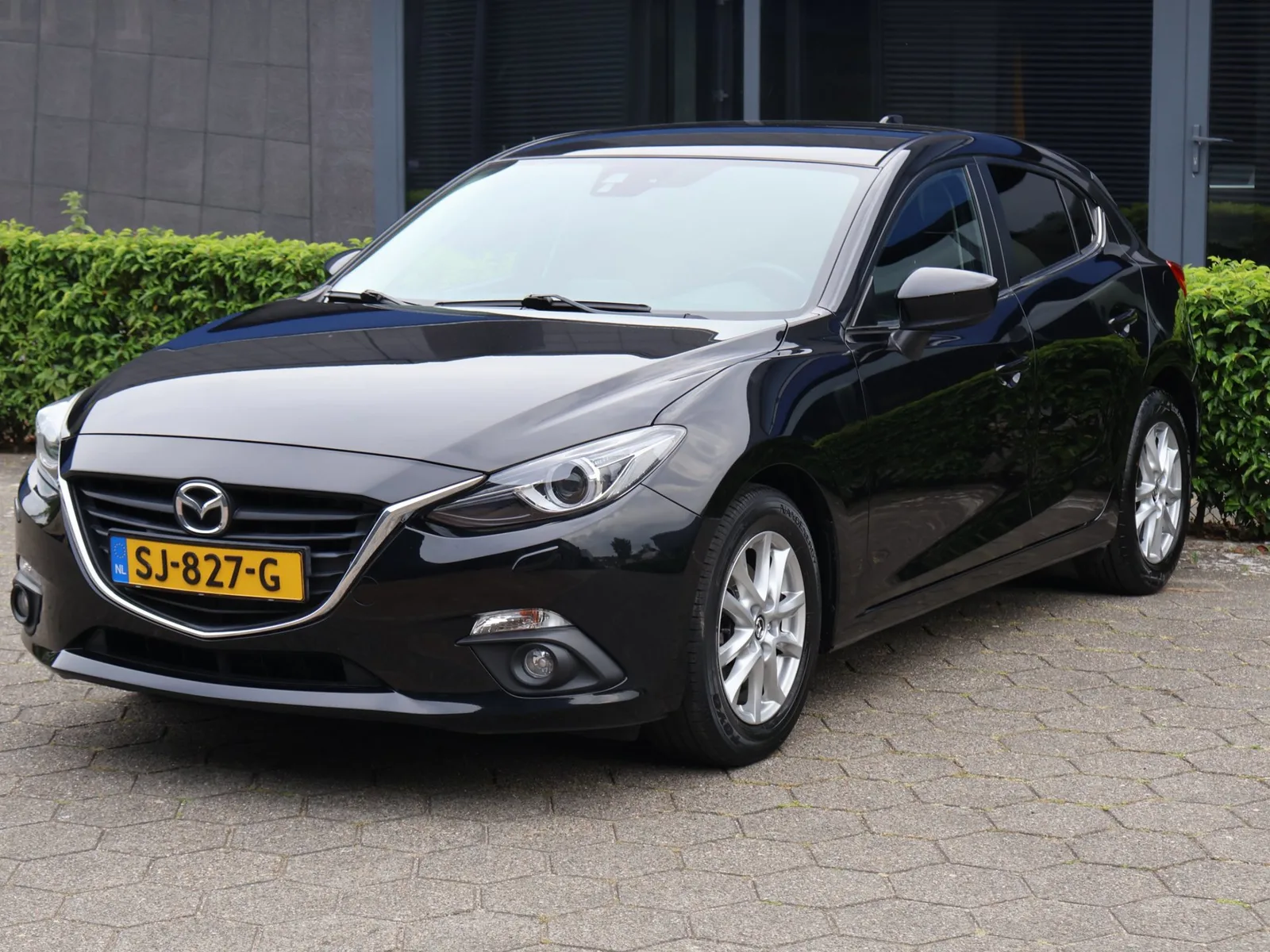 Mazda 3 (2014) — foto 1