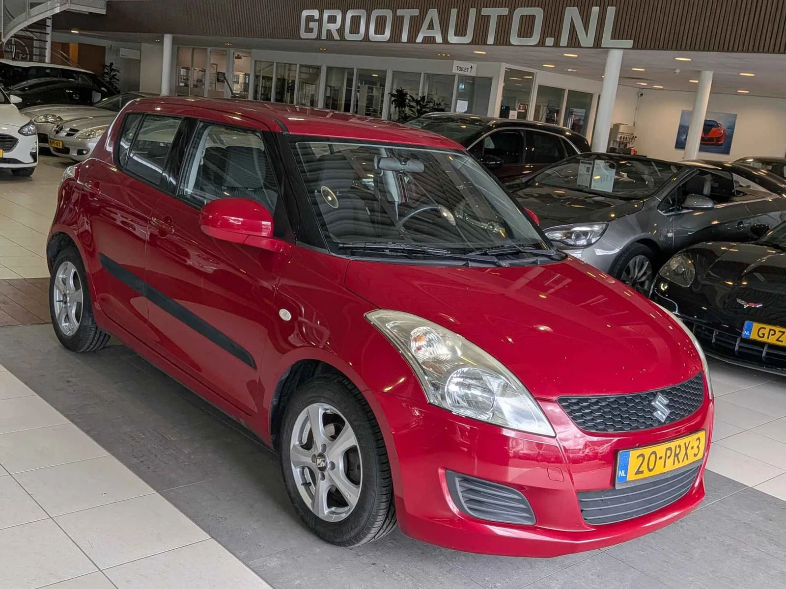 Suzuki Swift (2011) — foto 1