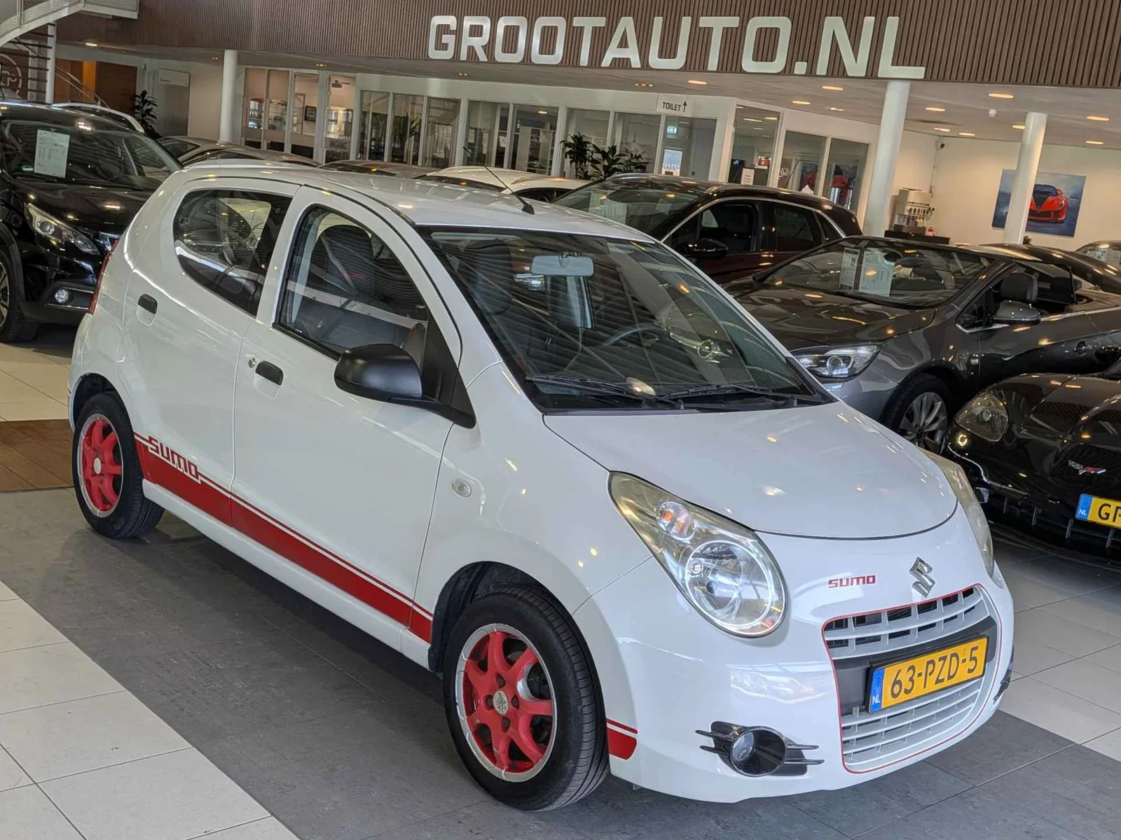 Suzuki Alto (2011) — foto 1
