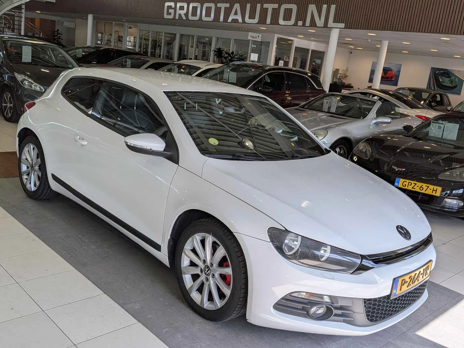 Volkswagen Scirocco (2011) — foto 1