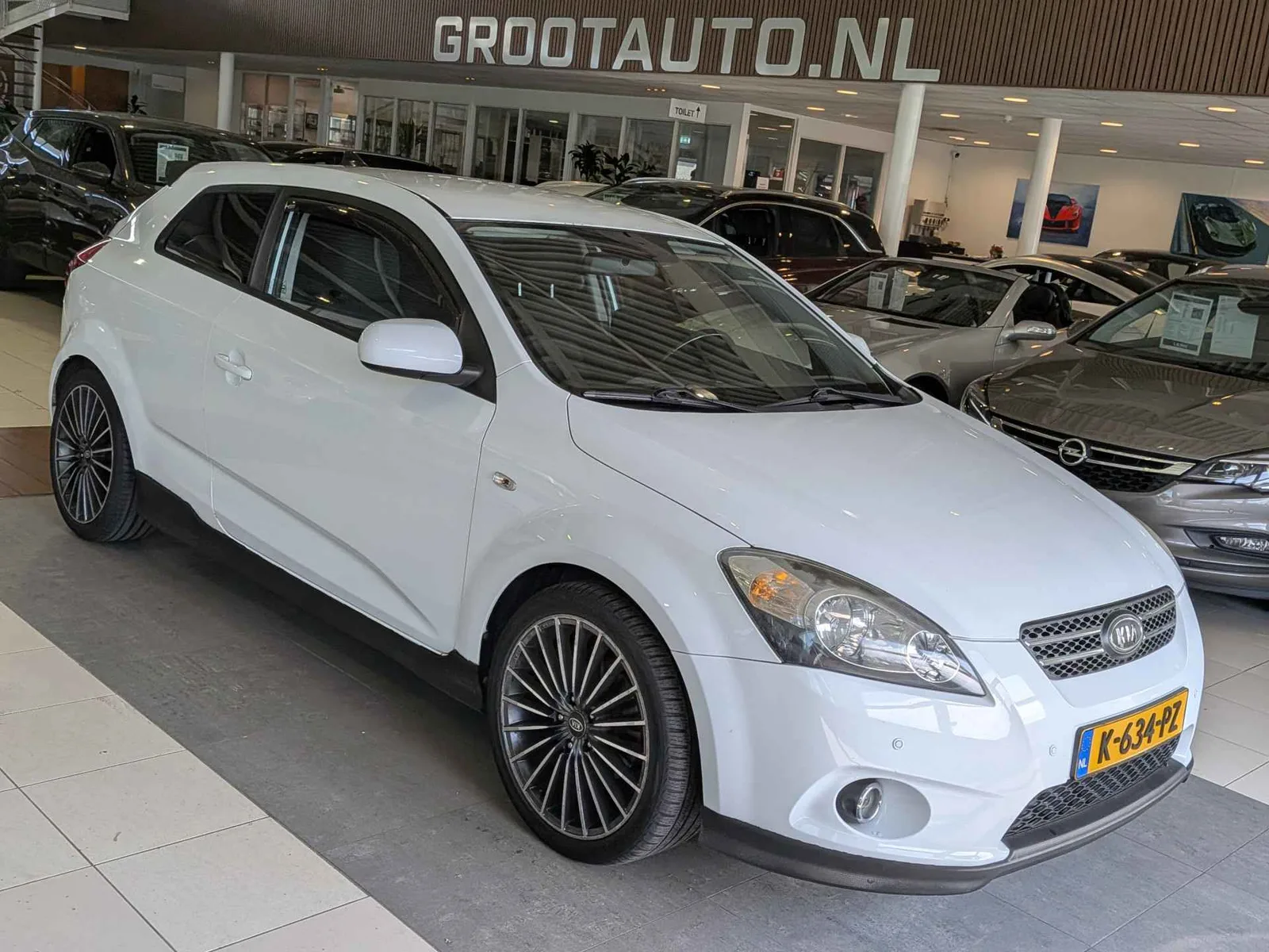 Kia Pro Cee'd (2011) — foto 1