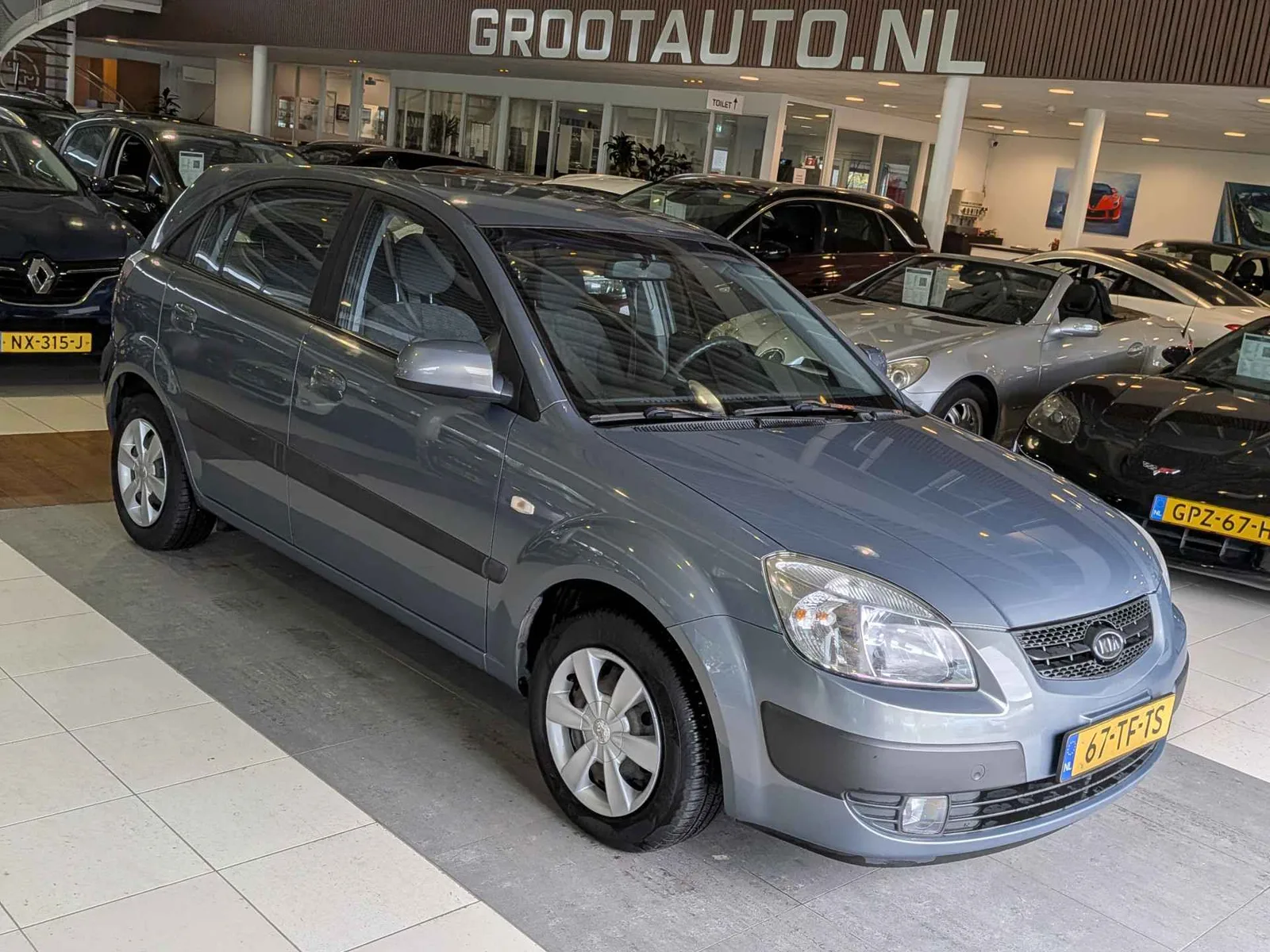 Kia Rio (2006) — foto 1