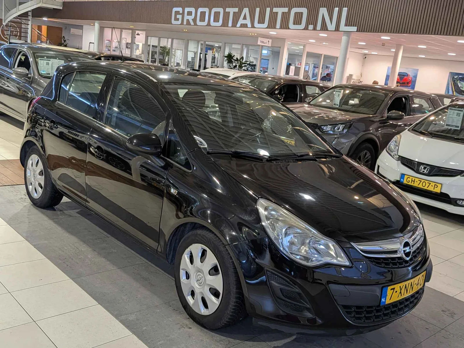 Opel Corsa (2011) — foto 1
