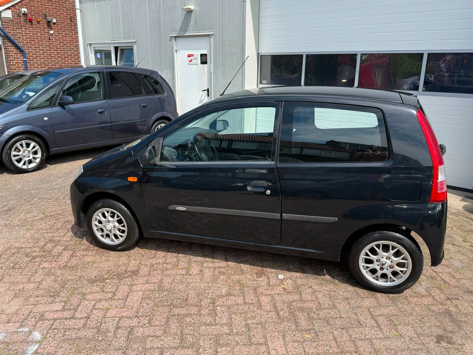 Daihatsu Cuore (2006) — foto 1