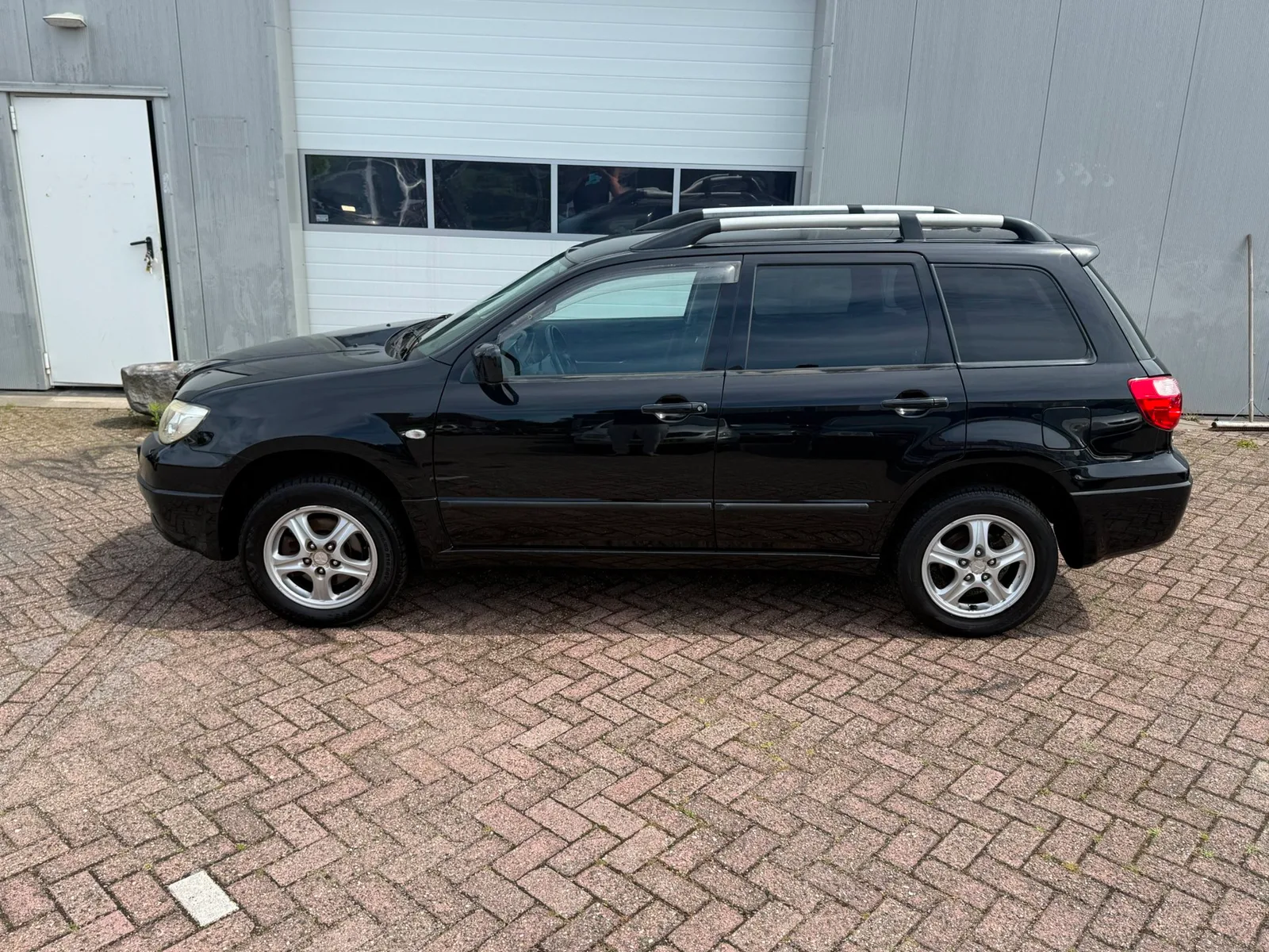 Mitsubishi Outlander (2006) — foto 1