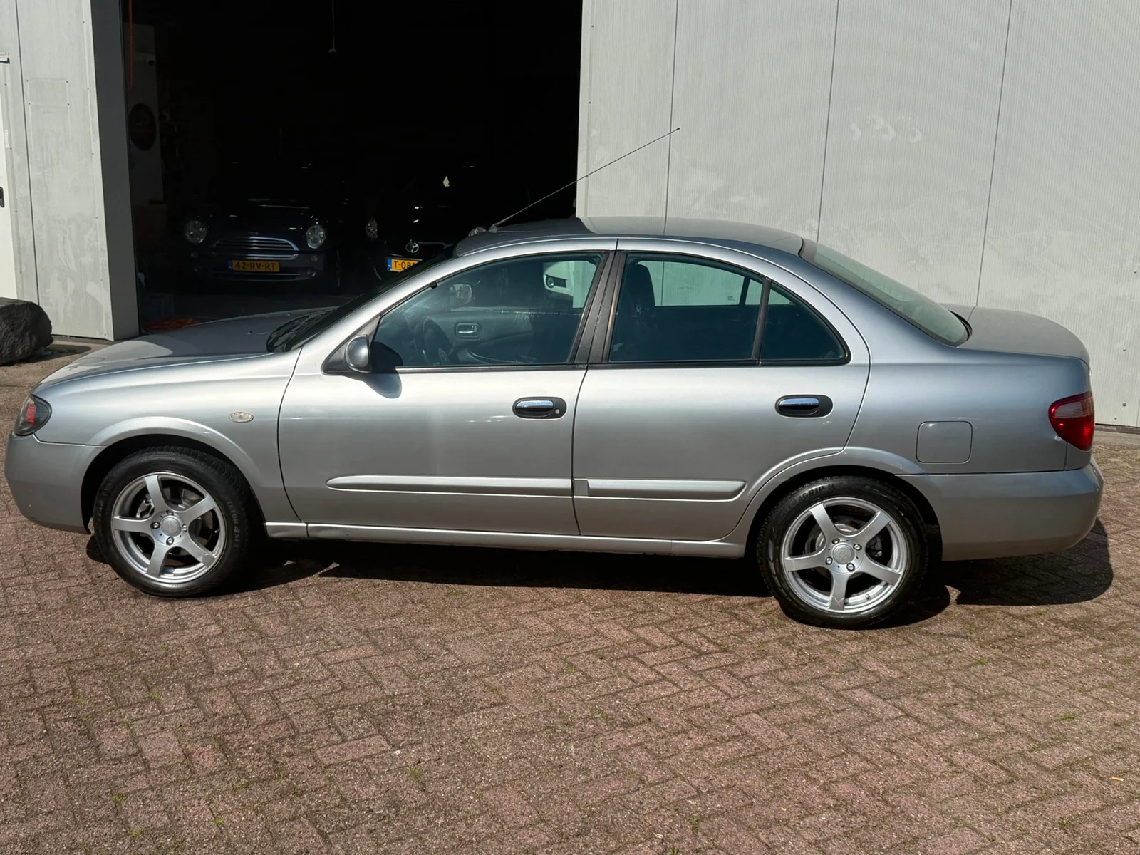 Nissan Almera (2006) — foto 1