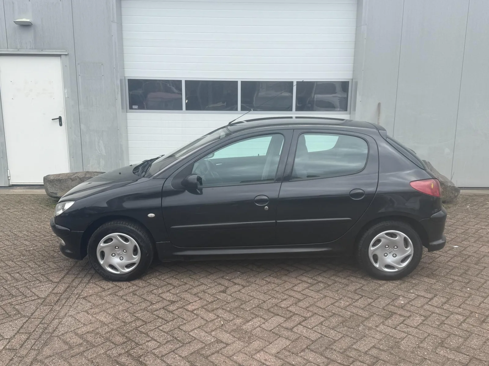 Peugeot 206 (2003) — foto 1