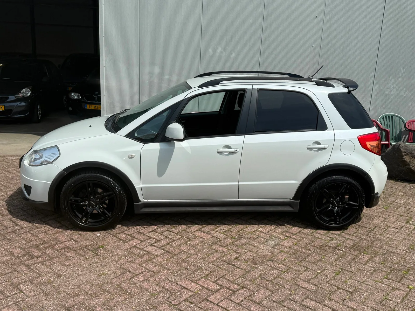 Suzuki SX4 (2008) — foto 1