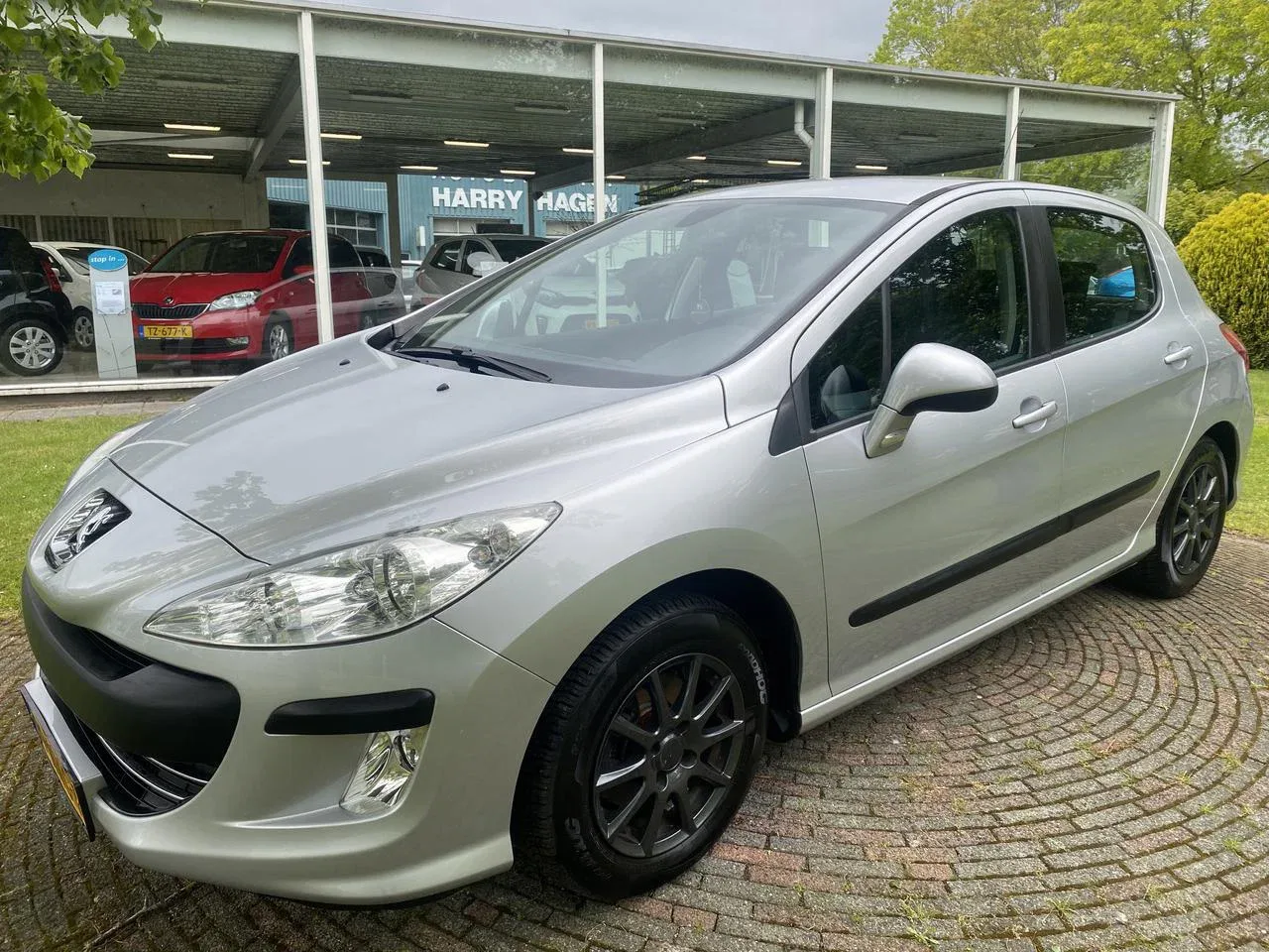 Peugeot 308 (2010) — foto 1