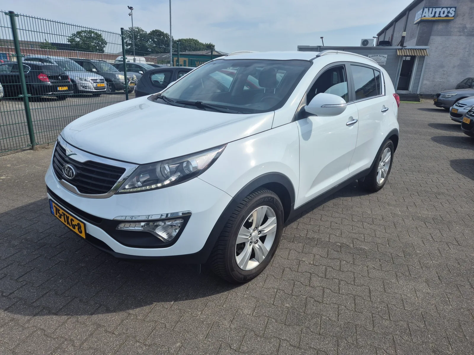 Kia Sportage (2012) — foto 1