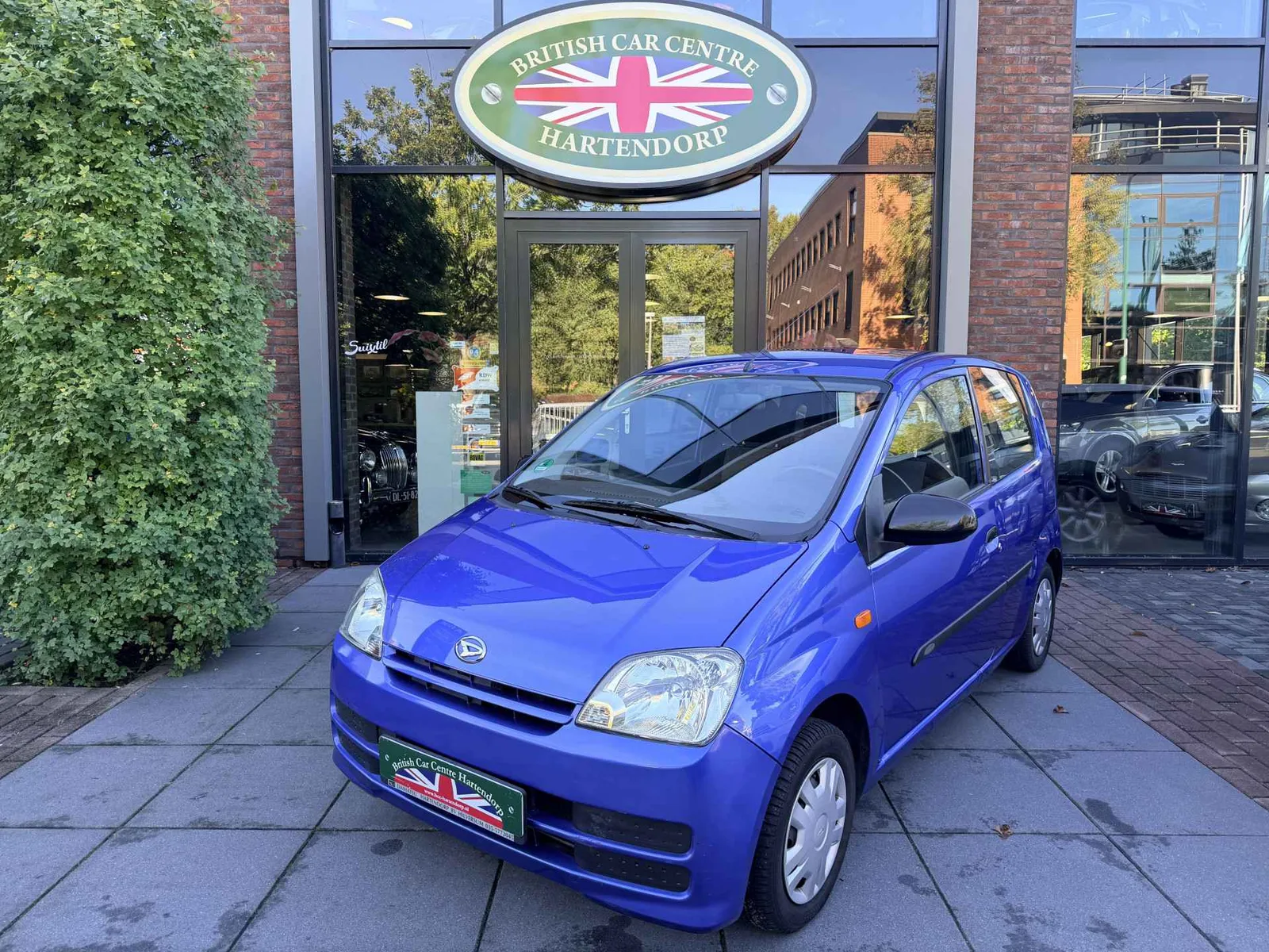 Daihatsu Cuore (2008) — foto 1