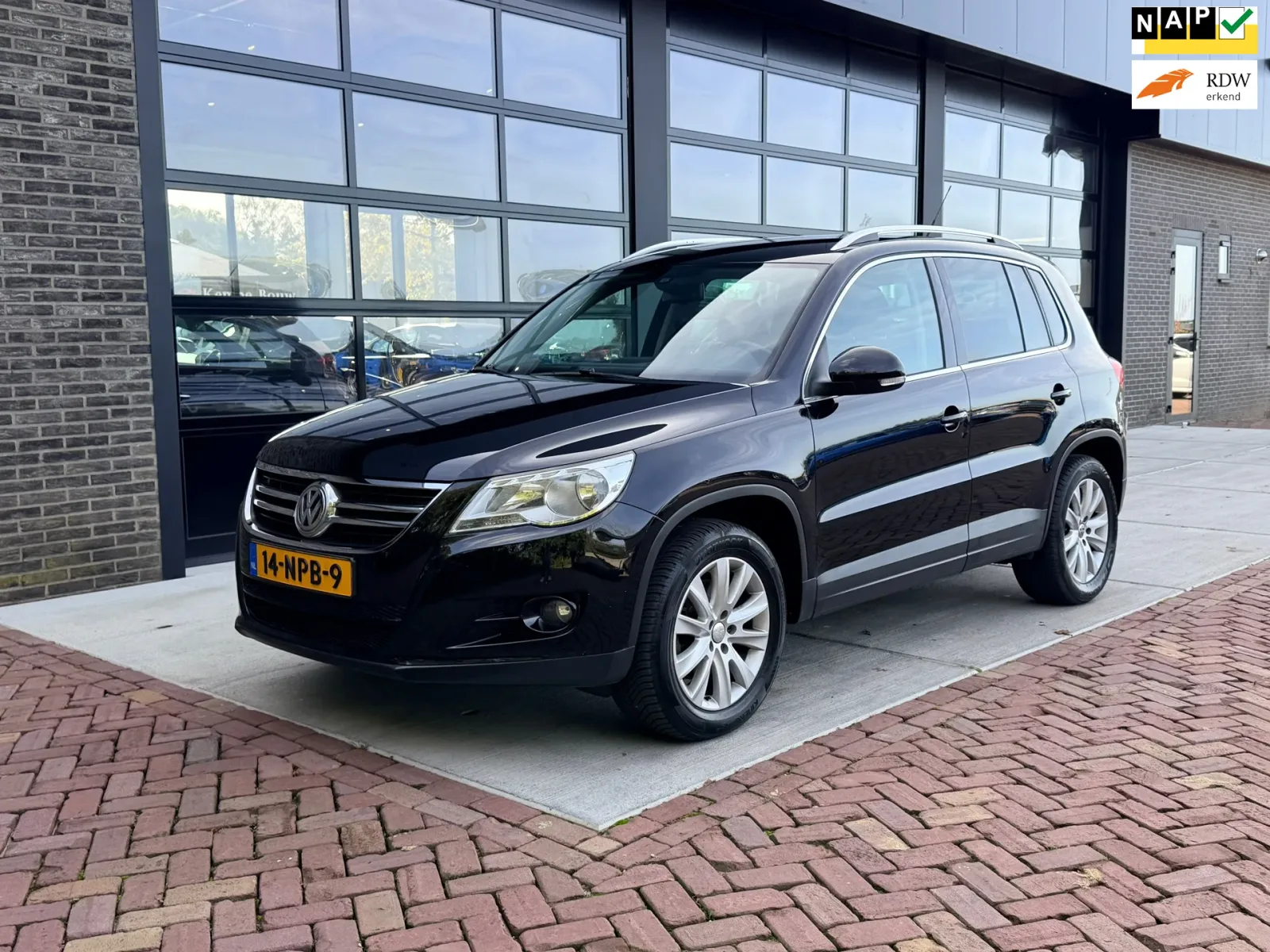 Volkswagen Tiguan (2010) — foto 1