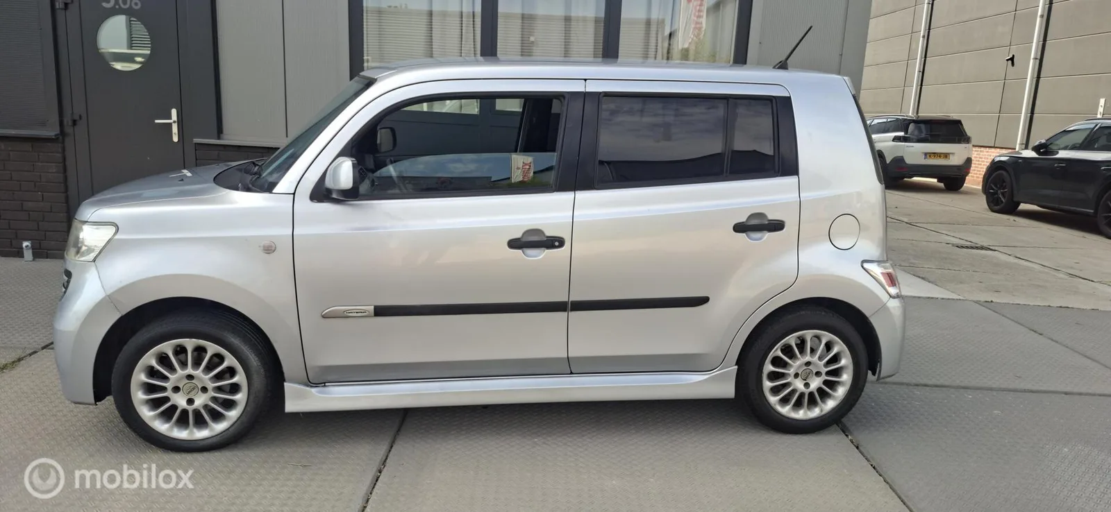 Daihatsu Materia (2009) — foto 1