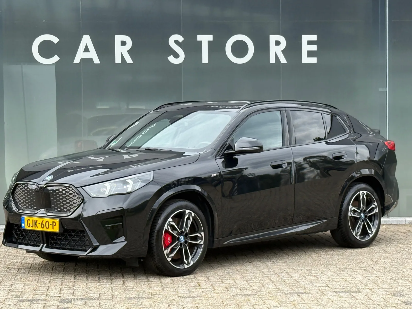 BMW iX2 (2024) — foto 1