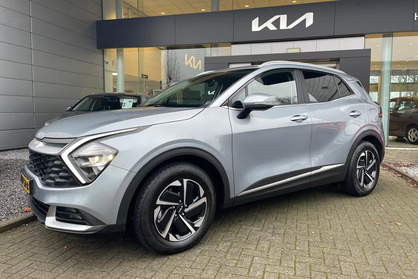 Kia Sportage (2023) — foto 1