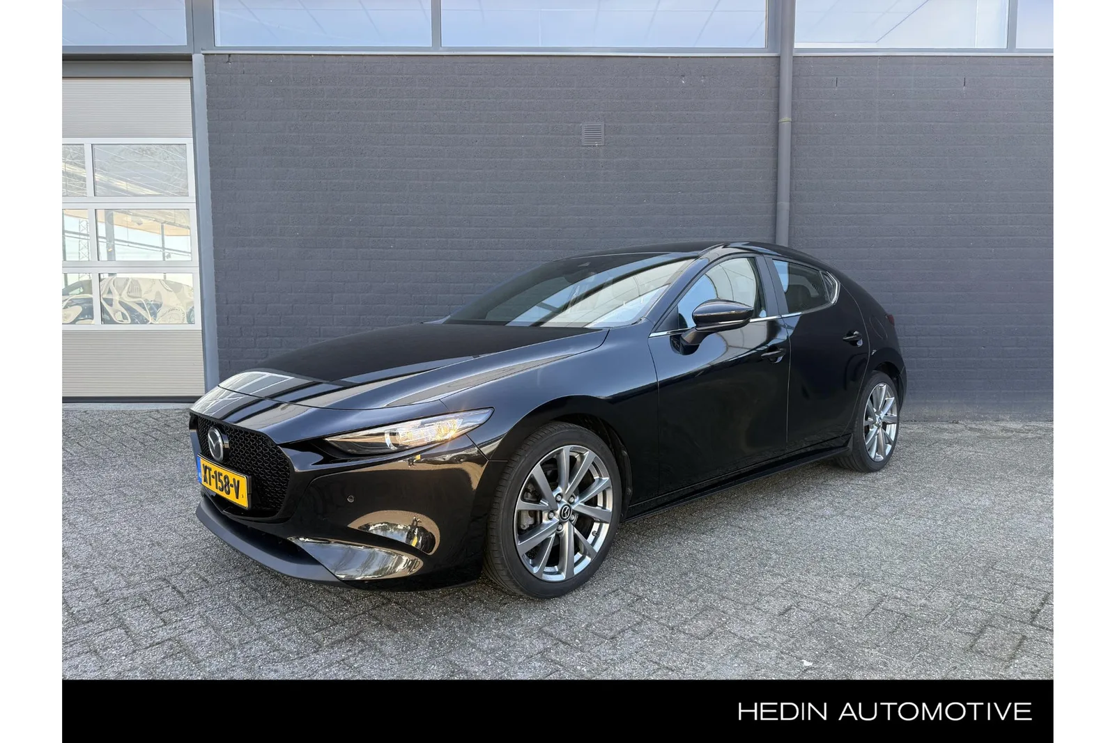 Mazda 3 (2019) — foto 1