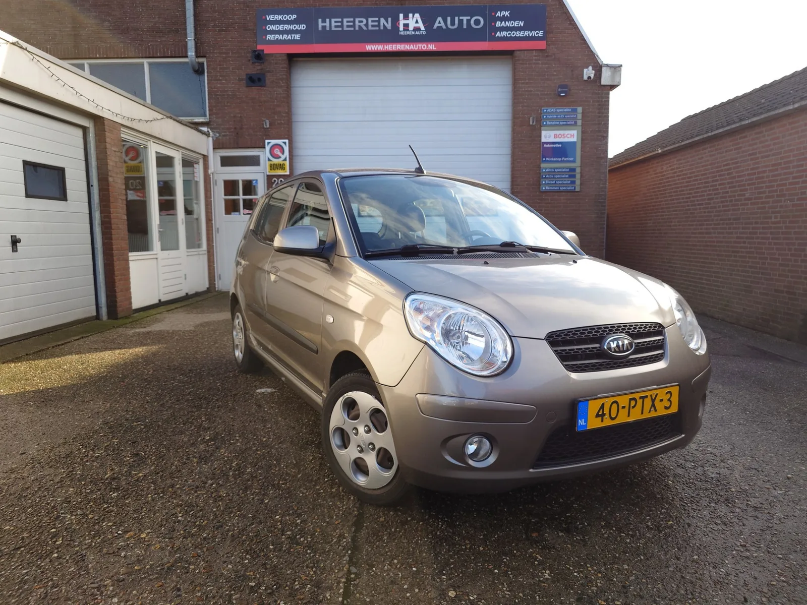 Kia Picanto (2011) — foto 1