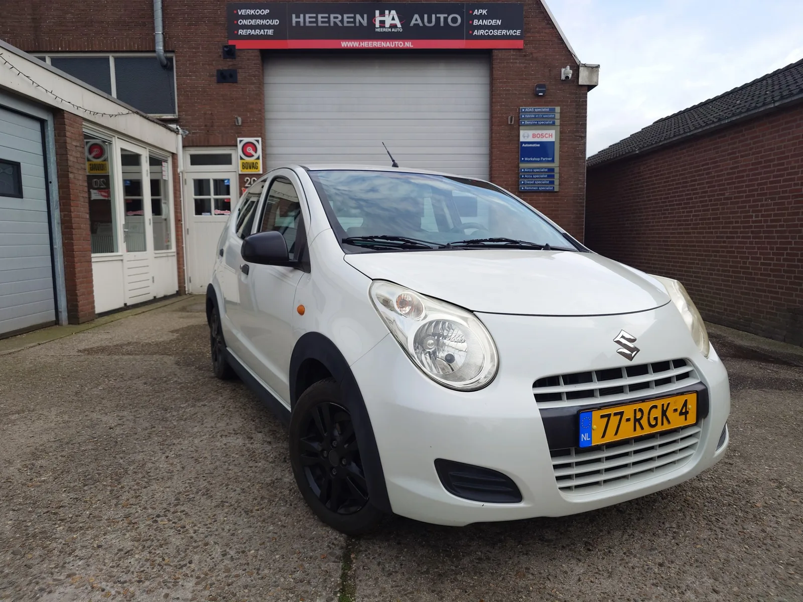 Suzuki Alto (2011) — foto 1