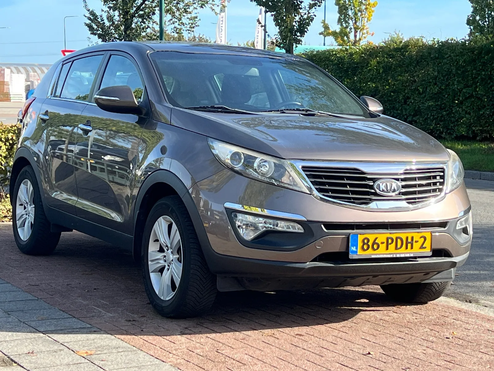 Kia Sportage (2011) — foto 1