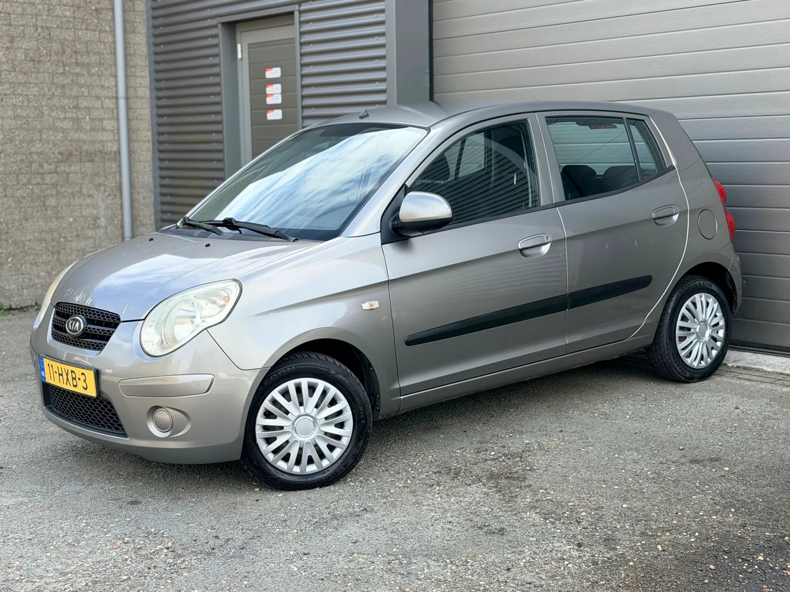 Kia Picanto (2009) — foto 1
