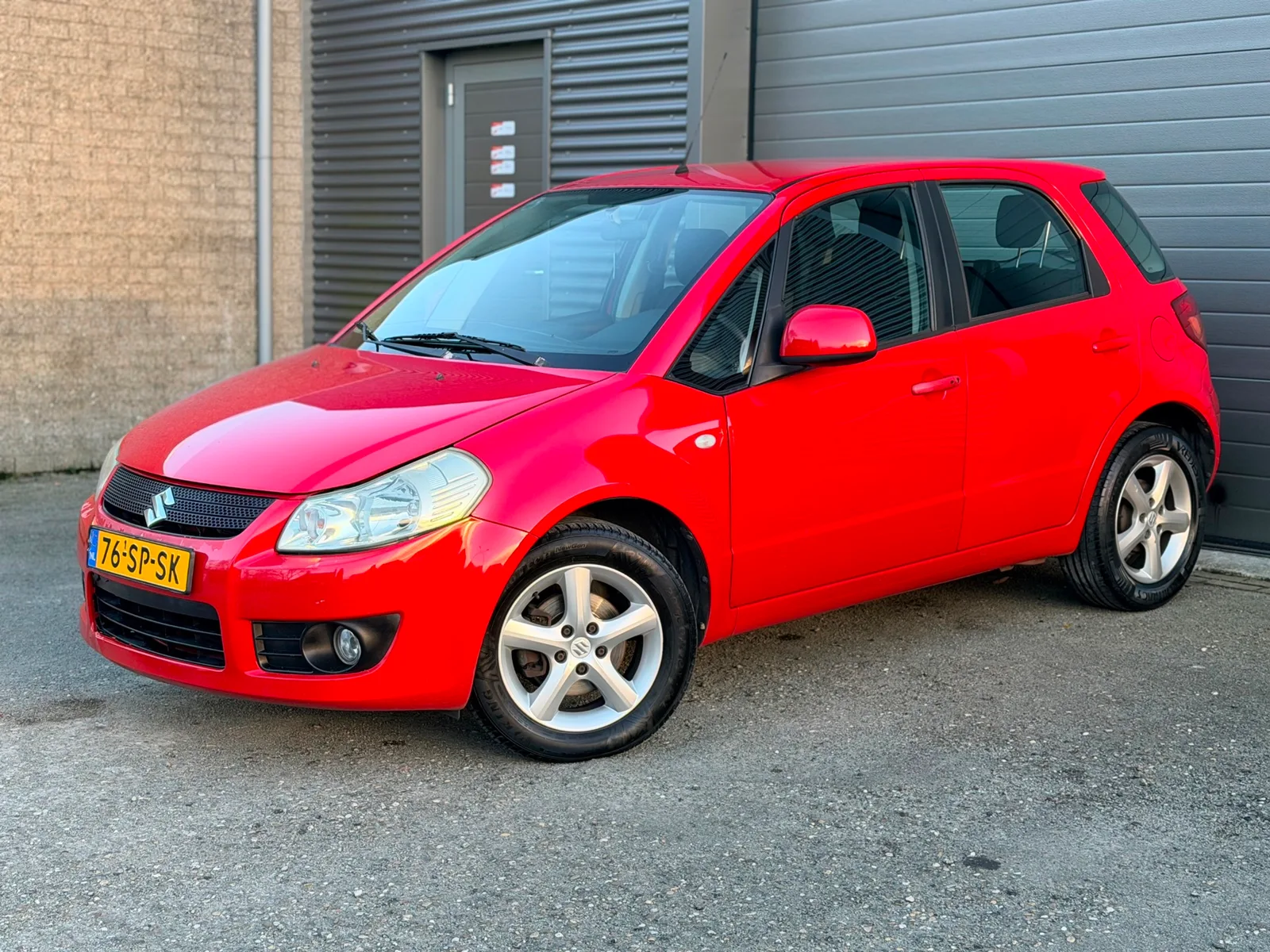 Suzuki SX4 (2006) — foto 1