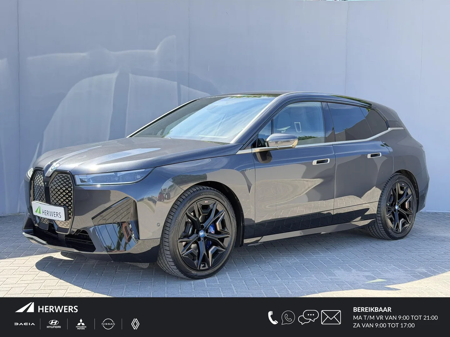 BMW iX (2023) — foto 1