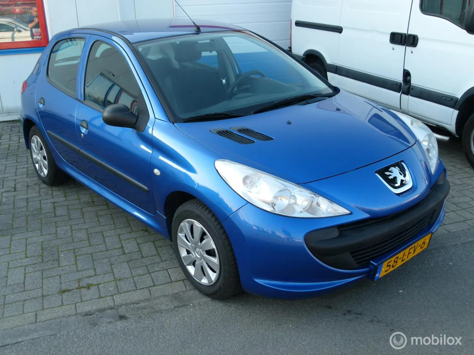 Peugeot 206 (2010) — foto 1