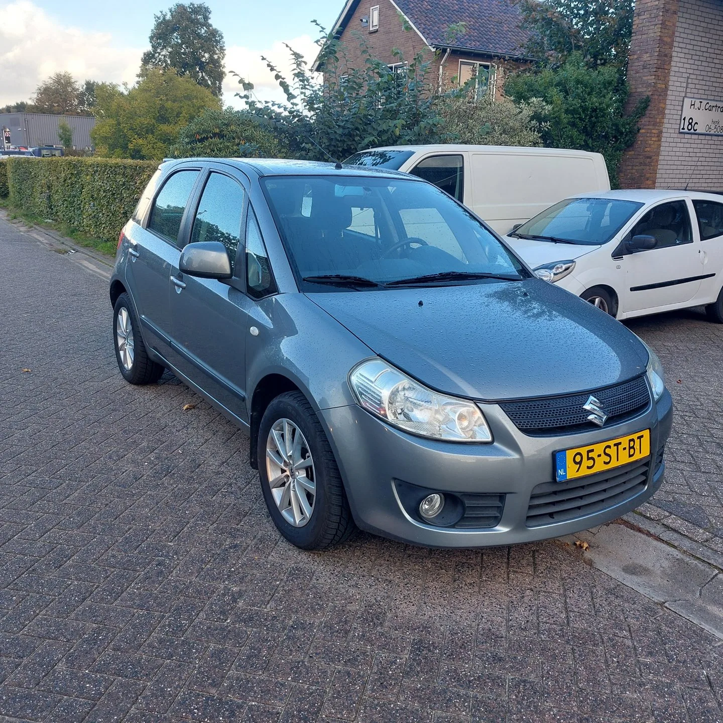 Suzuki SX4 (2006) — foto 1