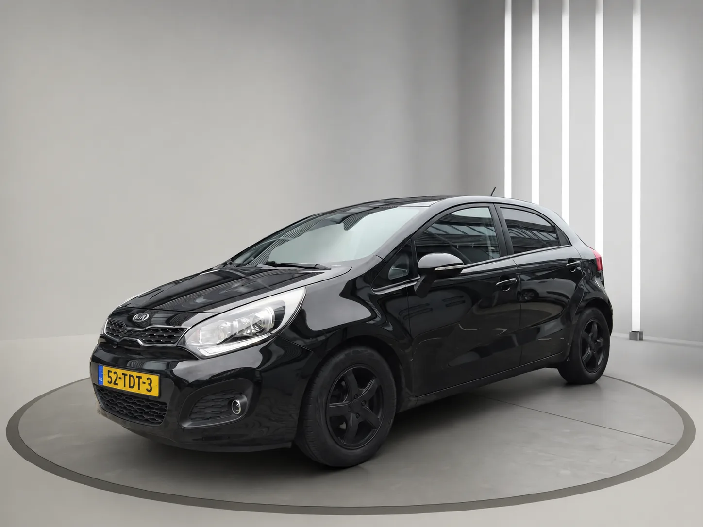 Kia Rio (2012) — foto 1