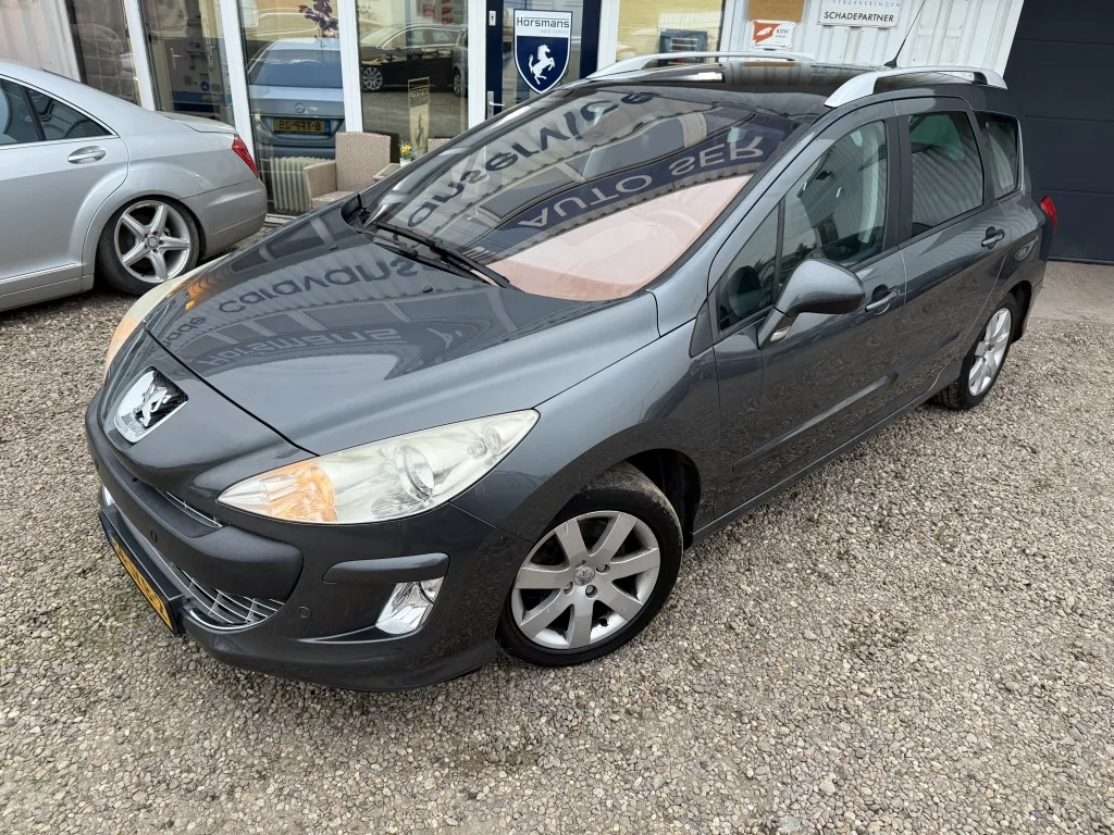 Peugeot 308 (2009) — foto 1