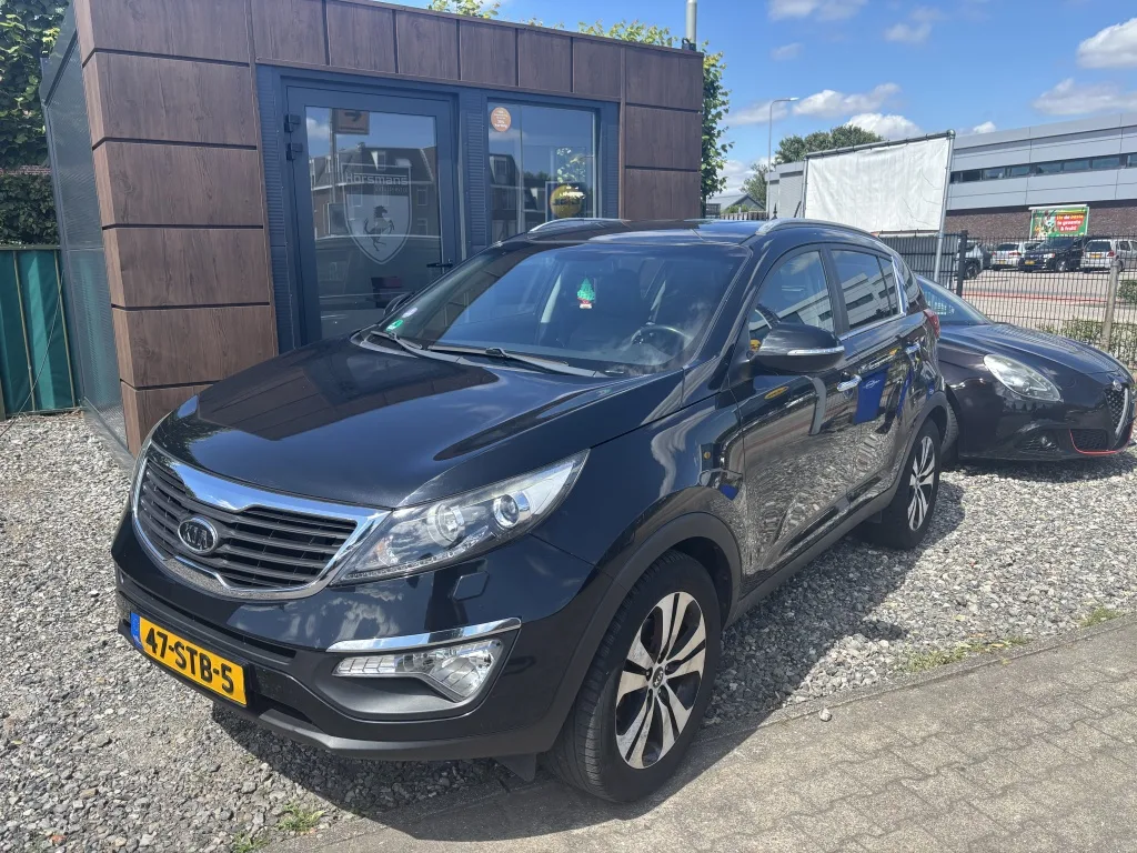 Kia Sportage (2012) — foto 1