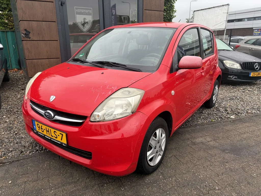 Subaru Justy (2009) — foto 1
