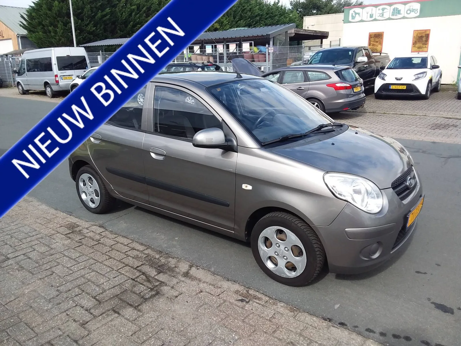 Kia Picanto (2011) — foto 1