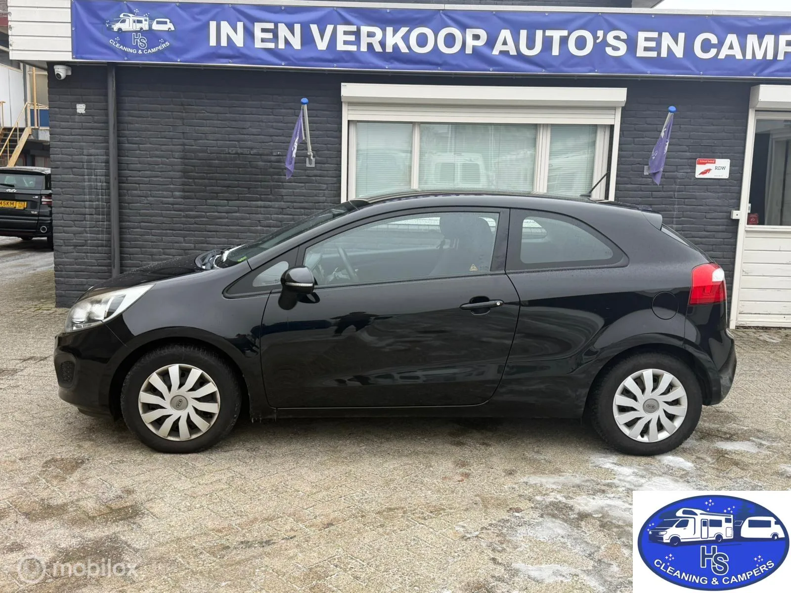 Kia Rio (2013) — foto 1