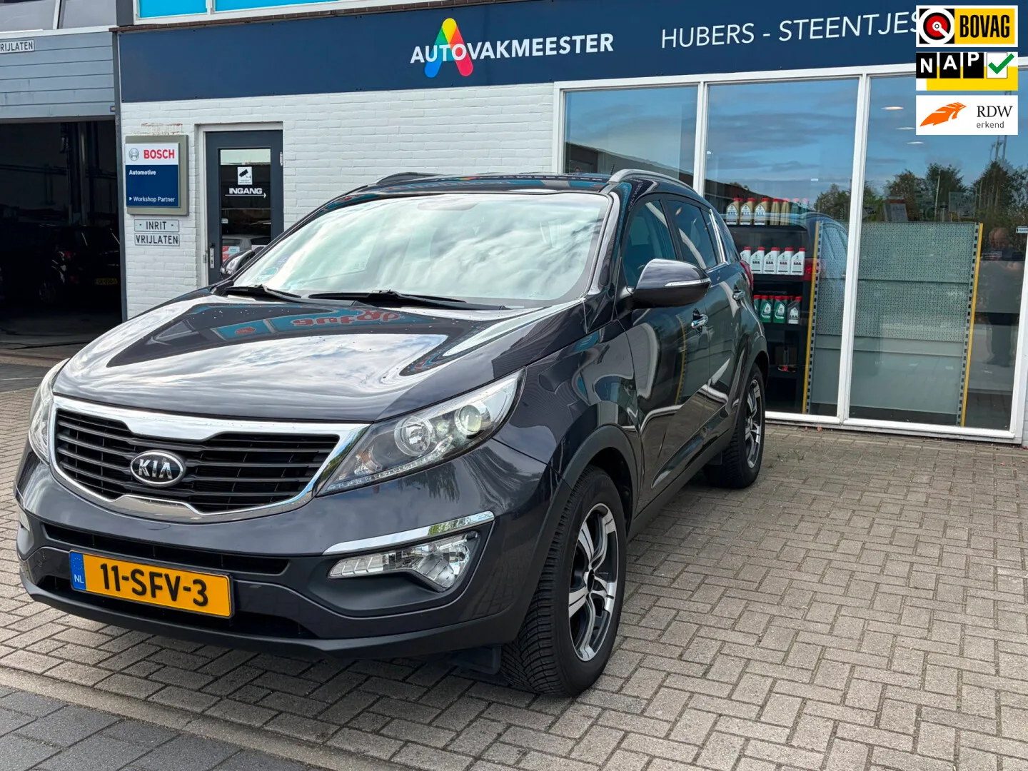 Kia Sportage (2011) — foto 1