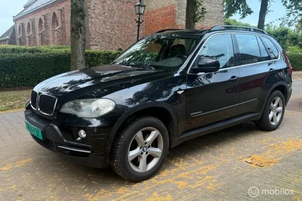 BMW X5 (2010) — foto 1