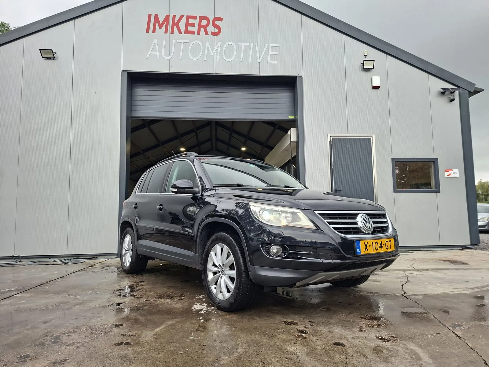 Volkswagen Tiguan (2009) — foto 1