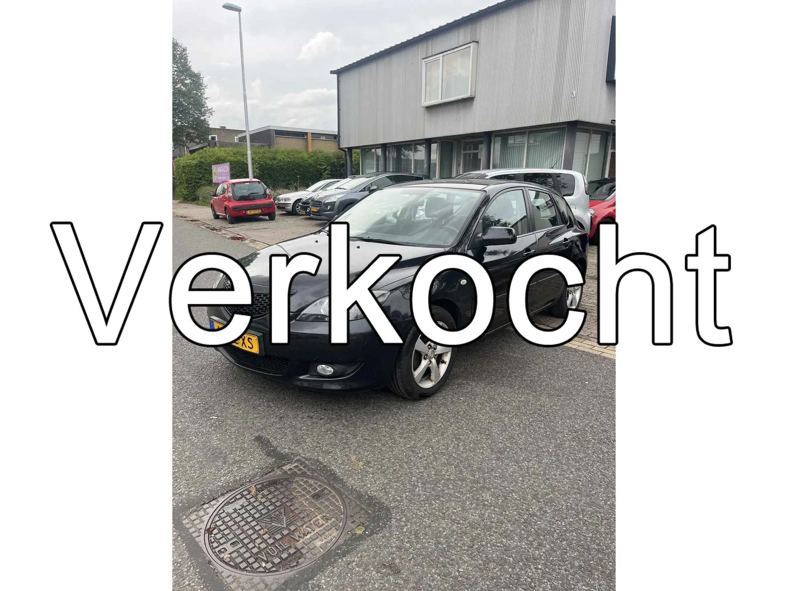 Mazda 3 (2005) — foto 1