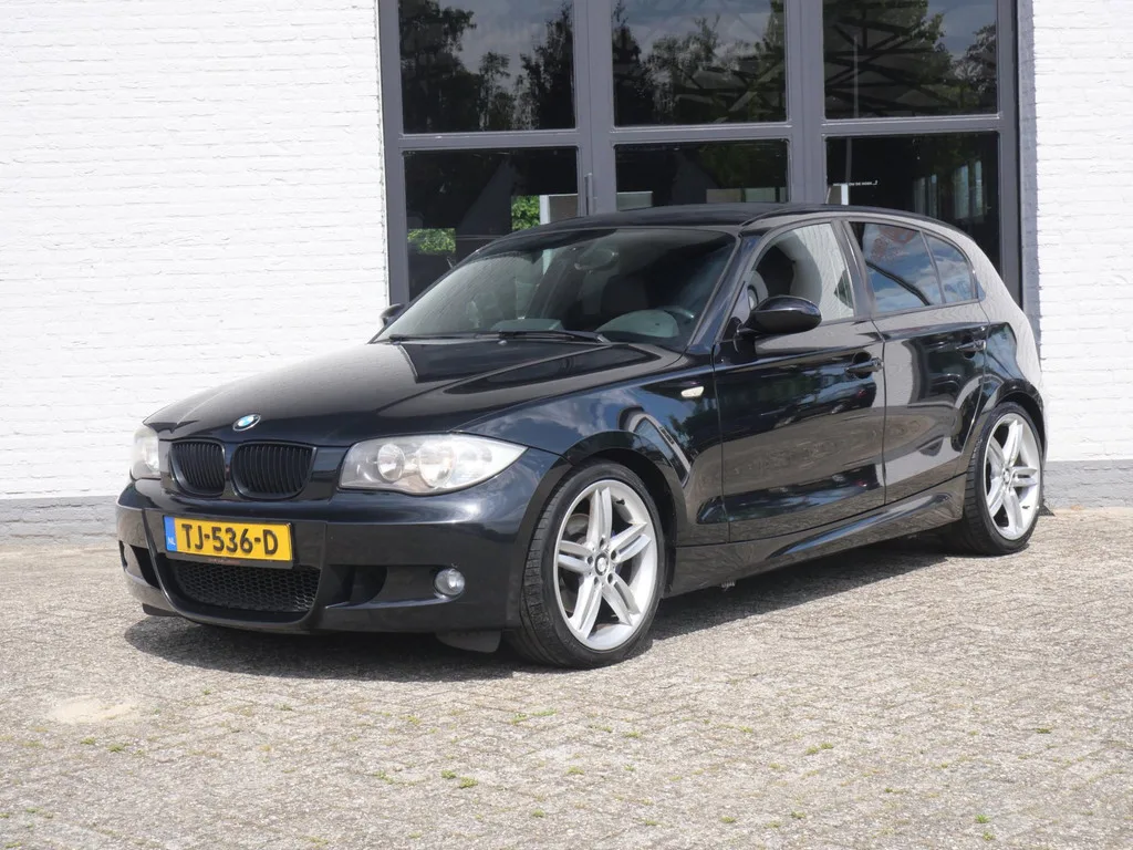 BMW 1-Serie (2009) — foto 1