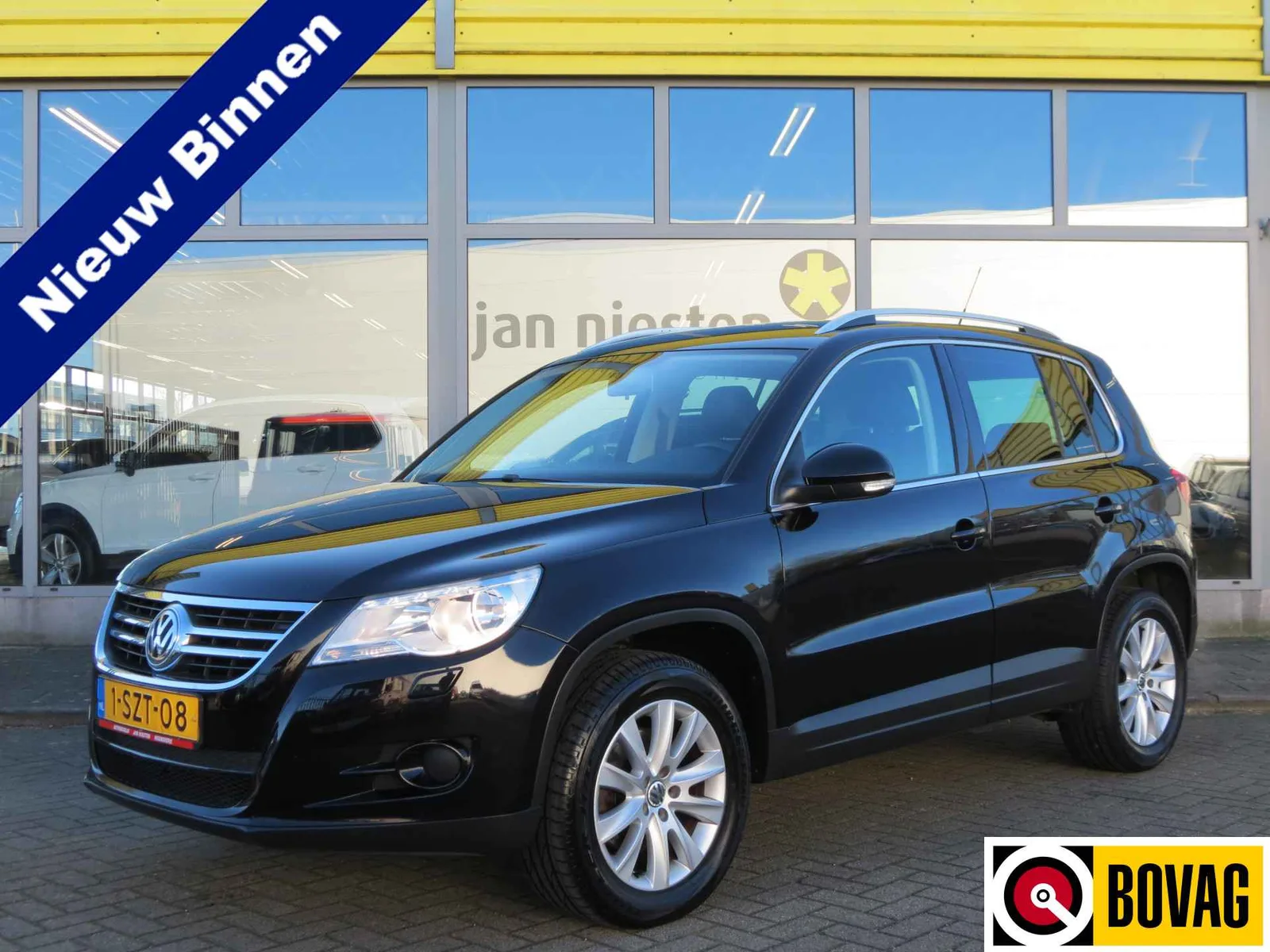 Volkswagen Tiguan (2009) — foto 1