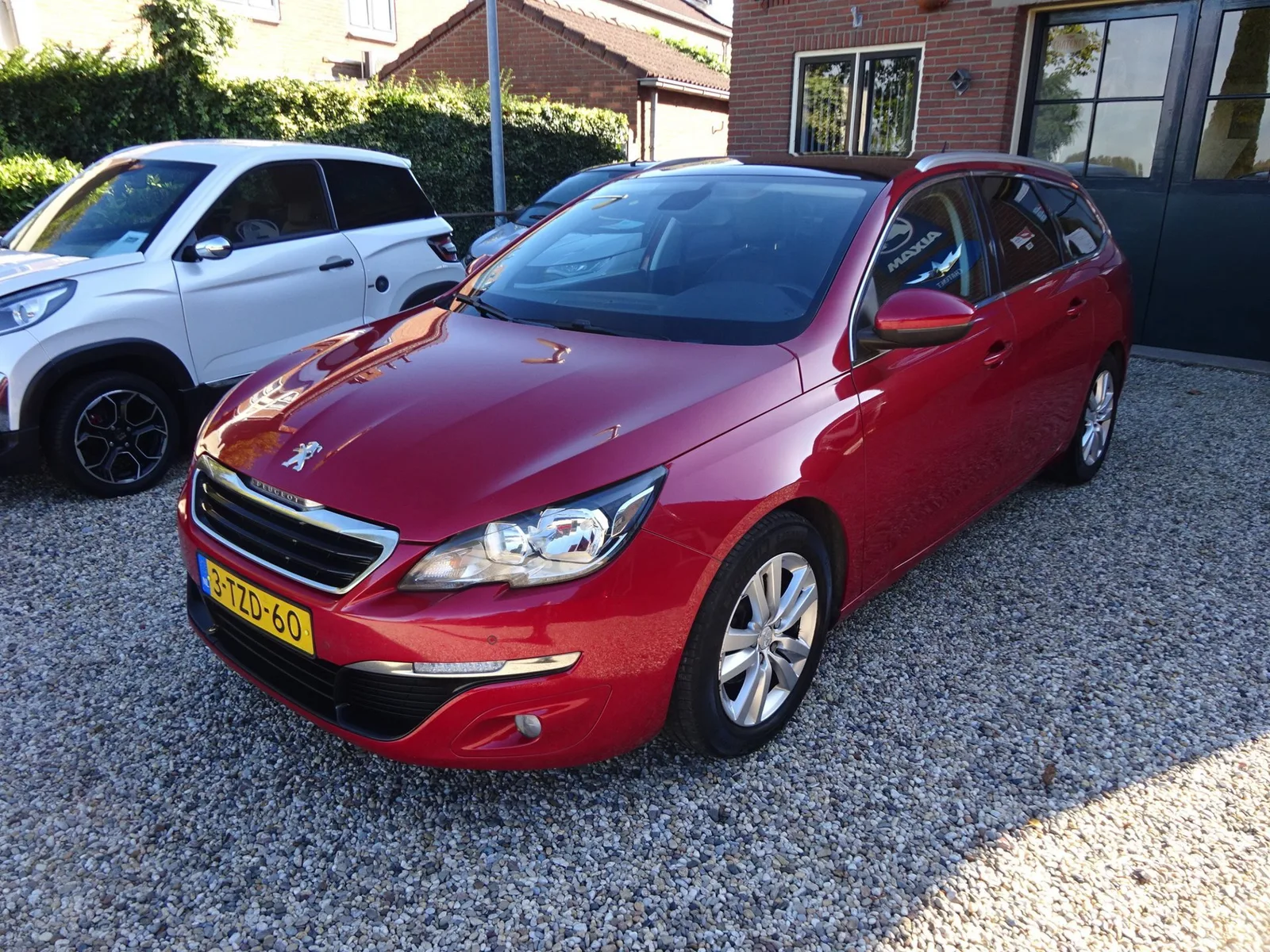 Peugeot 308 (2014) — foto 1
