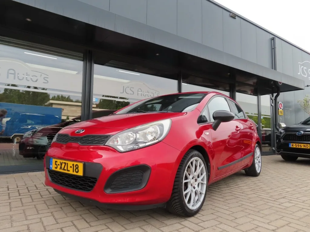 Kia Rio (2014) — foto 1