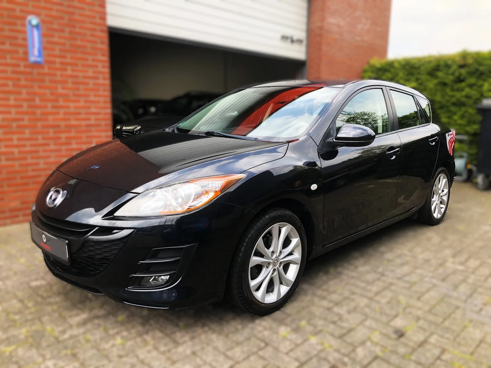 Mazda 3 (2011) — foto 1