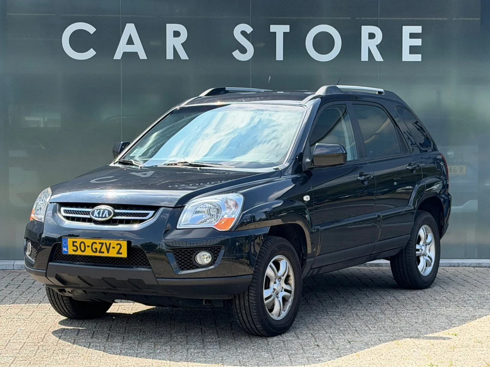 Kia Sportage (2008) — foto 1
