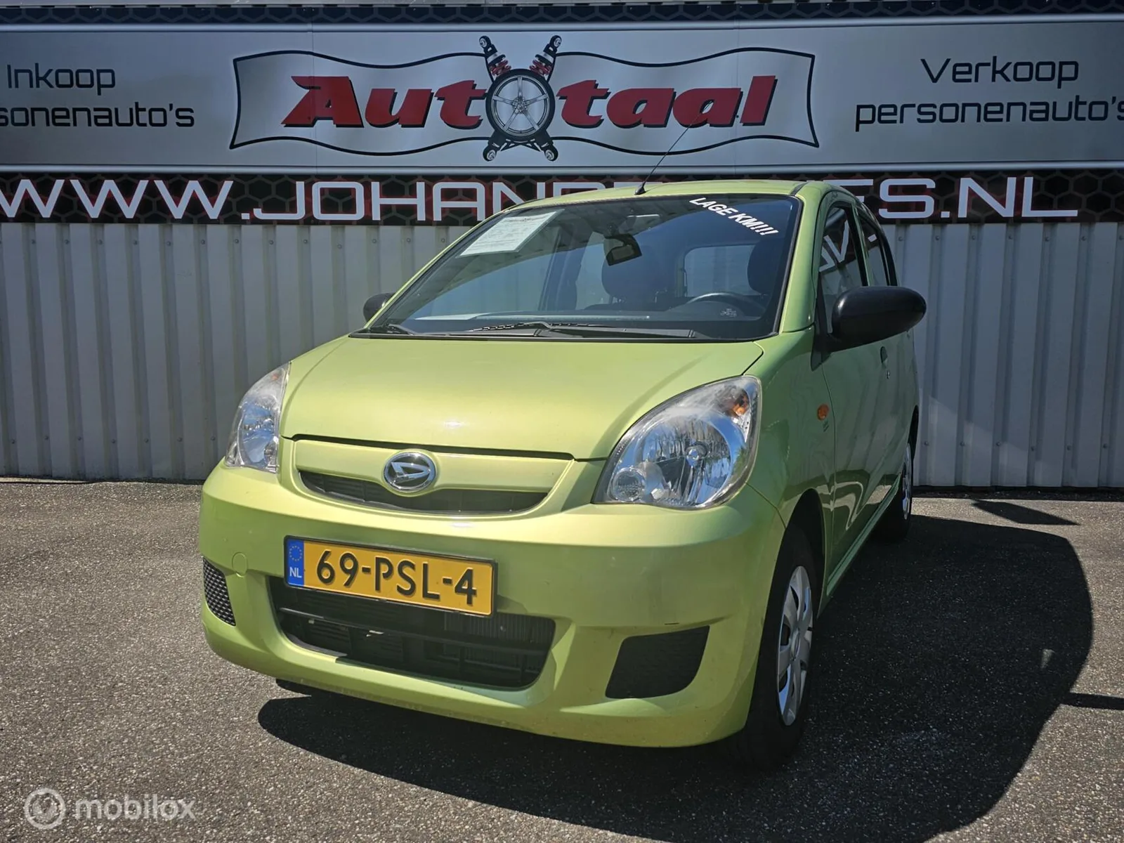 Daihatsu Cuore (2011) — foto 1