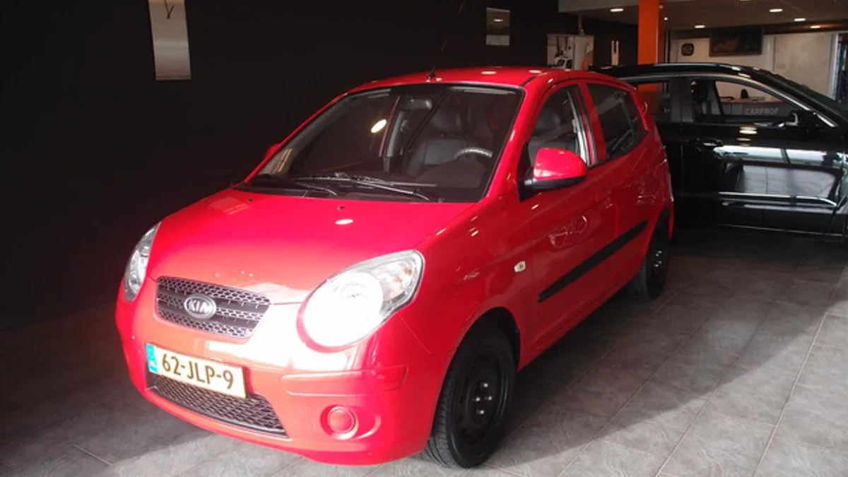 Kia Picanto (2009) — foto 1