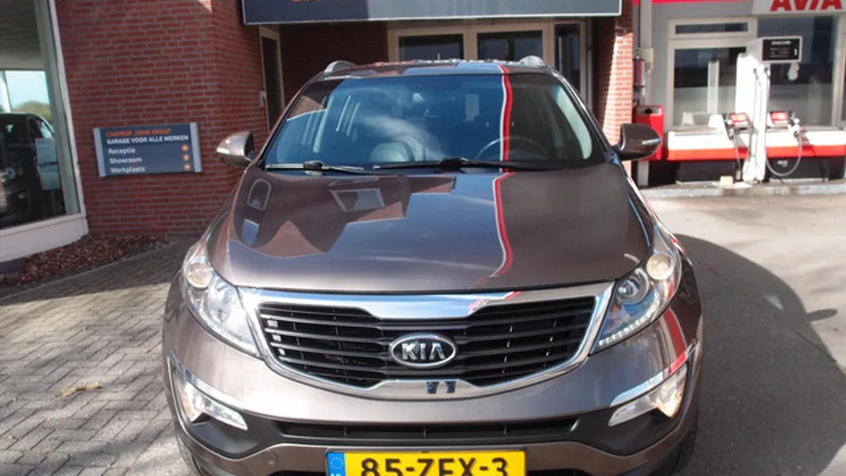 Kia Sportage (2012) — foto 1